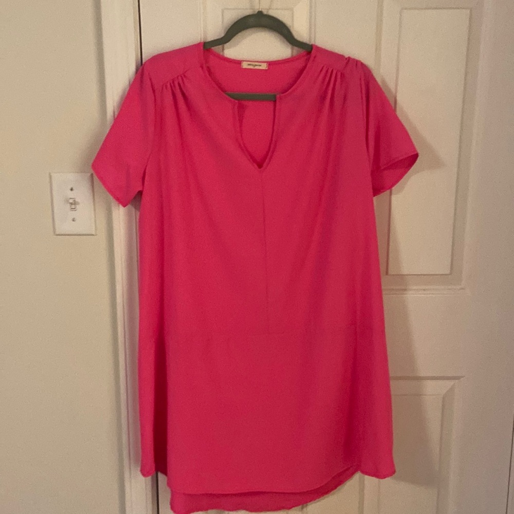 Hot pink.  Small. Never been worn